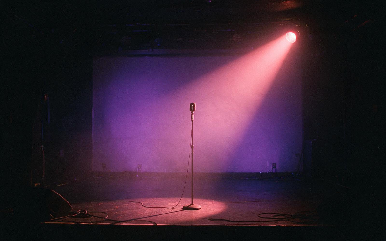 Moodboard 3 — empty stage, coral spotlight in haze